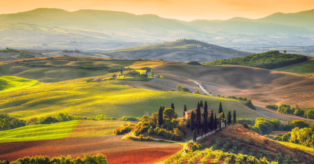 Landscape of a farmhouse, hills, and vineyard in Florence, Tuscany. Everythingtravel.