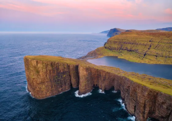 Sorvagsvatn Lake and Waterfall into the Ocean in Western Faroe Island, post processed in HDR